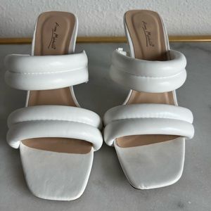 White puffy heels